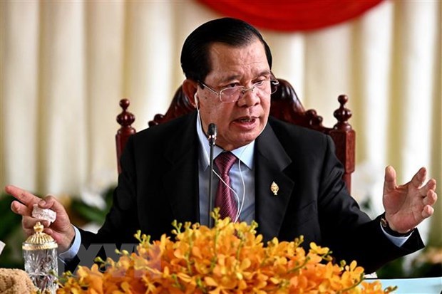 Cambodia’s ruling party forms coalition with 27 political parties hinh anh 1