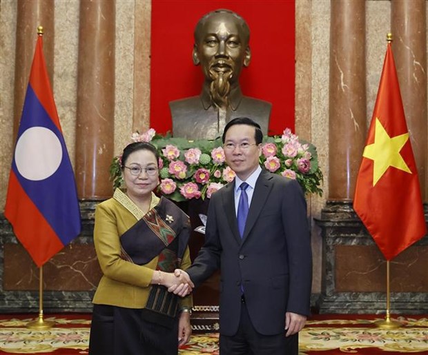 State leader welcomes new ambassadors of Venezuela, Laos hinh anh 2