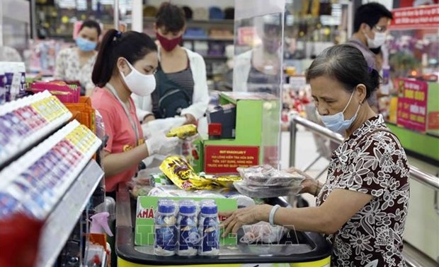 Promotions keep year-end consumer market busy hinh anh 1