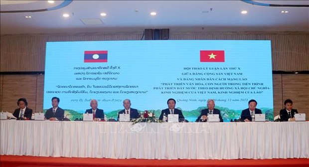 Vietnamese, Lao Parties hold 10th theoretical workshop hinh anh 1