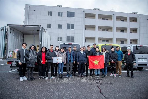 Earthquake-affected Vietnamese in Japan receive support hinh anh 1