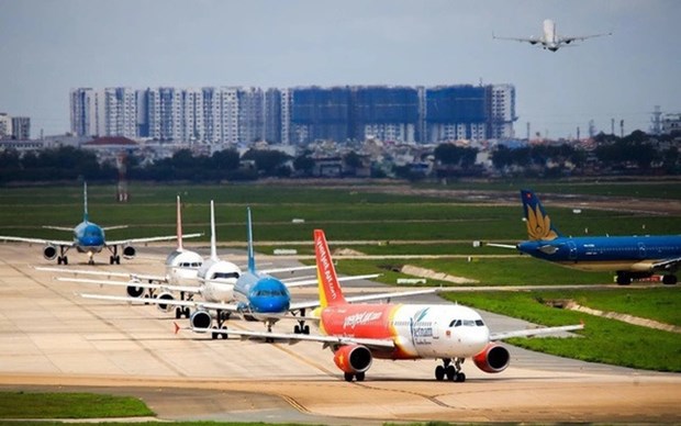 Airlines, railways increase seats amid rising travel demand during Tet hinh anh 1