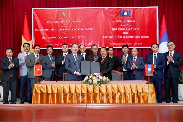 Vietnam Farmers’ Association ready to exchange, and share experiences with Laos hinh anh 1