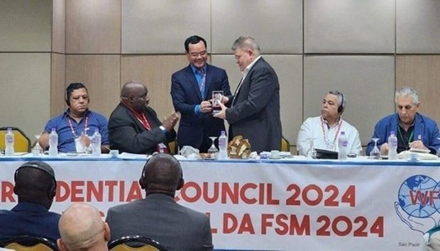 Vietnam steps up labour union cooperation with Brazil, Peru, Uruguay hinh anh 1